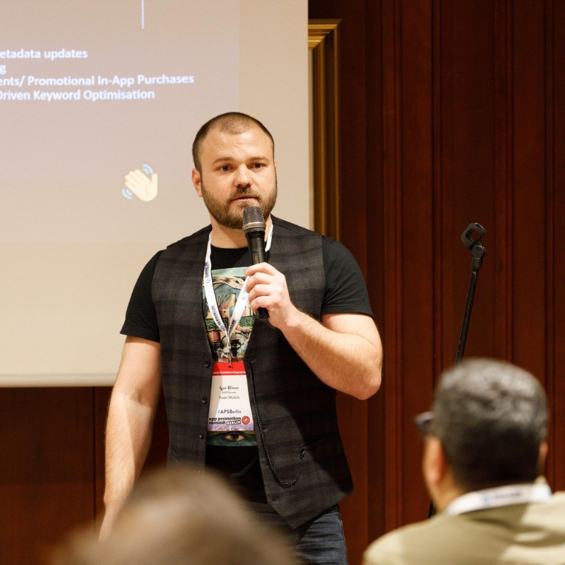 Igor Blinov speaking on stage